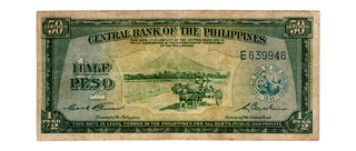 1957N HALF PESO\